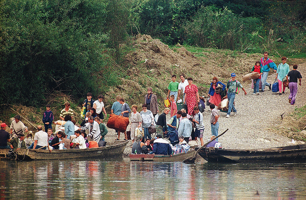 Refugees from the Serb-held Banja Luka region boarded ferries as they prepared to cross to Croatian soil on August 17, 1995, in Davor, 65 miles southeast of Zagreb.Thousands of Bosnian Croats and Muslims crossed the Bosnian-Croatian border as they came under pressure to move across the former Yugoslavia.