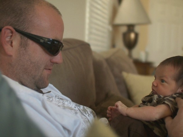One of the veterans, home from Pathway, cares for his newborn. One of the veterans, home from Pathway, cares for his newborn.
