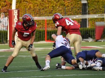 Off to the races: Tight end Kyle Juszczyk (44) shook off tacklers on a 59-yard pass play, giving Harvard a 28-0 halftime lead over Bucknell.