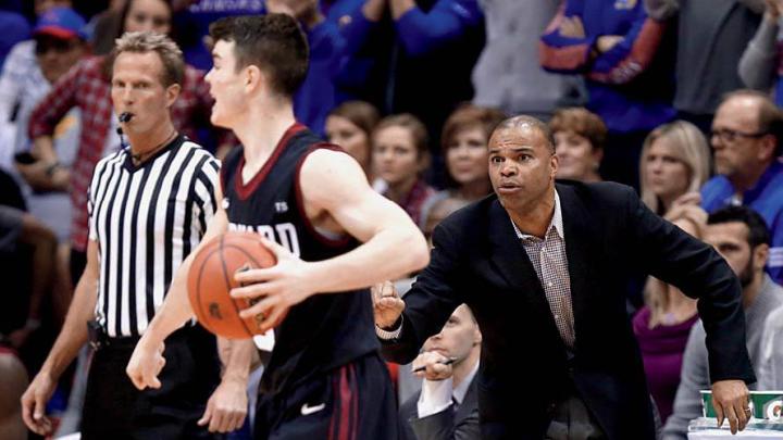 Coach Tommy Amaker is trying to shape a young Crimson squad, including freshman point guard Tommy McCarthy, shown in action against the University of Kansas.