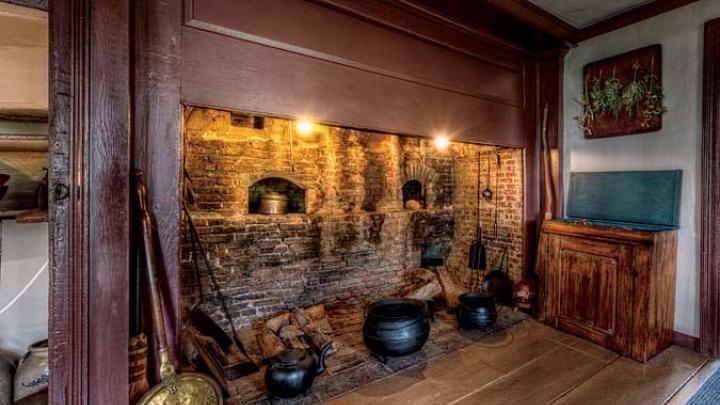 The kitchen at Hawthorne’s birth home, restored to reflects its original design, has an open hearth.