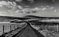 black and white scence of long road