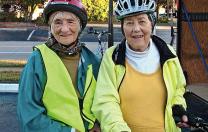 While cycling the East Coast Greenway, Linda Cabot Black and Elizabeth Brody pause for some Florida sunshine. 