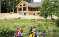 Paddling on Long Pond with the Appalachian Mountain Club’s Gorman Chairback Lodge in the background