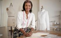 Designer Katiti Kirondé with her white shirts at the Fashion Lab of Fisher College in Boston