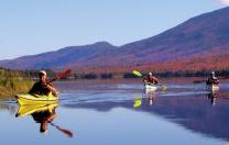 Paddlers enjoy the serenity of Flagstaff Lake, Maine.