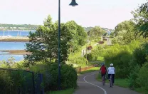 Cyclists of all levels can enjoy the coastal Eastern Promenade Trail in Portland.