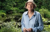 Volunteer guide Al Levin at the Lily Pond in Garden in the Woods