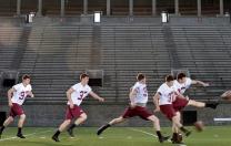 In Harvard Stadium, David Mothander practices a kickoff, using the ubiquitous &ldquo;soccer-style&rdquo; kicking technique. Scroll down for a <a href="#placekick">video.</a></p> 