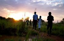 Children from New Hope orphanage in Busia, Uganda, make their nightly walk to get water for drinking and washing. They handle all the chores themselves—an important part of director Ken Mulago’s strategy for running the orphanage. “We want our children to behave as responsible adults,” he says. “We don’t want to raise them up just to think about themselves.”