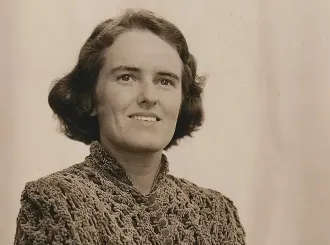 Barbara Lawrence seated, wearing a textured blouse, in a portrait from the late 1930s.