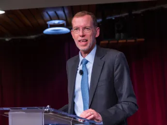 Dean Elmendorf at a podium 