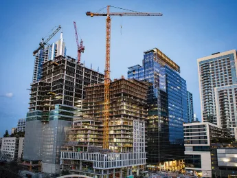 City skyline with construction of skyscrapers in the foreground