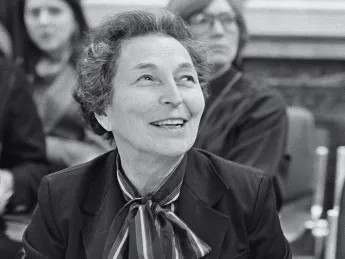 Anna Schwartz in a room with other people