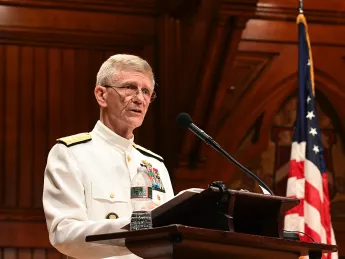 Vice Admiral Philip Cullom addresses audience at Sanders Theater