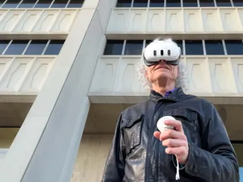 Harvard University's Steven Pinker wearing a virtual reality headset