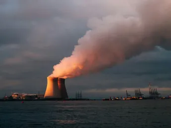 Image of two nuclear plants in the evening