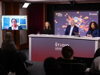A series of medical experts gathered around a table at Harvard's Chan School, discussing the issue of cancer misinformation online.