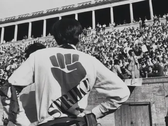 Students attend a mass rally at Harvard Soldiers Field in April 1969 to debate whether to continue striking.