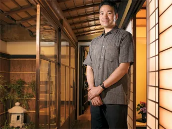 Art historian Yukio Lippit in the Japanese merchant's house at the Boston Children's Museum.