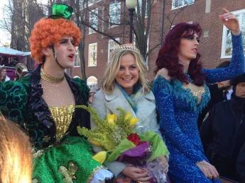 Amy Poehler with members of the Hasty Pudding Theatricals during a parade through Harvard Square