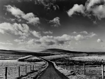 black and white scence of long road