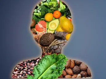 Silhouette of a human body comprised of food groups: fruit, nuts, legumes, vegetables, whole grains