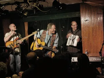John Forster (at keyboard, right) with Tom Chapin (center) and his band, playing at the Turning Point in Piermont, New  York.