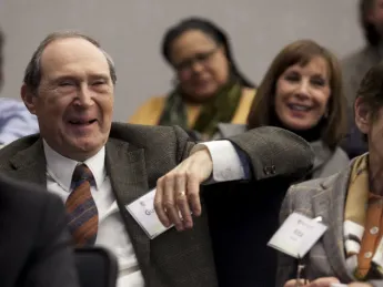 Gustave and Rita Hauser enjoy an afternoon panel.