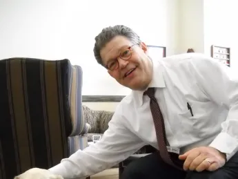 Al Franken with Blaine, the "official office dog" of his Senate office
