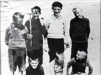 Michael Carney (standing left) with friends, and (seated) brothers Tom, Martin, and Paddy.