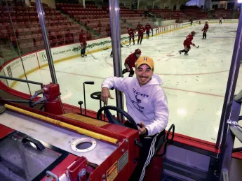 Matt Gilmore, sitting behind the wheel of a Zamboni