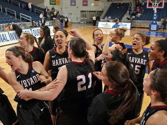 The women's basketball team celebrates their victory over Hofstra last night as they became the first team in Ivy League history to record a win in the WNIT.