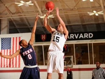 Co-captain Christian Webster, the team's only senior, shoots.