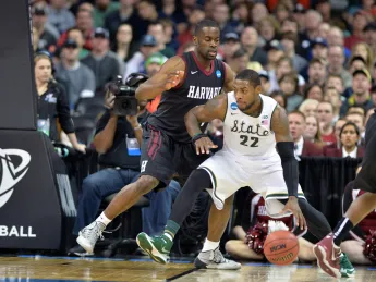 Steve Moundou-Missi '15, shown in last year's NCAA tournament (where Harvard very much hopes to return this season), anchored the Crimson with 17 points and 11 rebounds against Columbia last Saturday.