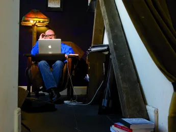 Andrew Sullivan in his “blog cave”