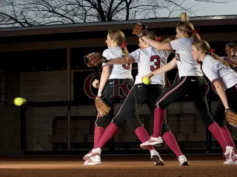 Multiple images of Rachel Brown’s pitching motion. Softball pitchers may take one step forward from the rubber while dragging the back foot.