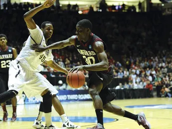 All-Ivy forward Kyle Casey ’13 drives toward the hoop against Vanderbilt’s Rod Odom.