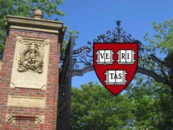 An open gate with the Harvard Logo over it