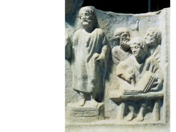 Photograph of a carved relief showing orator dictating to a scribe, from the fourth-century Roman Temple of Hercules at Ostia Antica