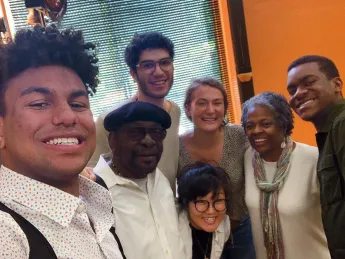 A group photo of the four Harvard undergraduates, including the author, with their project adviser and two local, older mentors