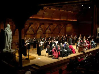 The Radcliffe Choral Society sings behind the Phi Beta Kappa officials, honored guests, and speakers during the literary exercises in Sanders Theatre. 