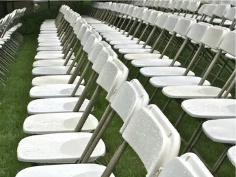 Wet chairs in Harvard Yard Tuesday morning. Rain is forecast for Tuesday, thunderstorms for Wednesday, and sun on Thursday.