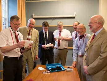 From left: David Otto, Bruce Johnson, Xandy Walsh, Alex Walsh, John Fryer ’63, Tony Rossmann, and Paul Bamberg