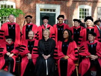Front row from left: José Antonio Abreu, Provost Alan Garber, President Drew Faust, Oprah Winfrey, and Thomas M. Menino. Back row from left: C. (Clemmie) Dixon Spangler Jr, Donald R. Hopkins, Lord Robert M. May, Sir Partha Dasgupta, JoAnne Stubbe, and Elaine Pagels.