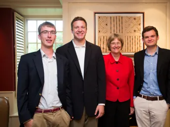 Harvard President Drew Faust greets the winners of the President's Challenge for social entrepreneurship in her office, in advance of the public announcement of their win. Florian Mayr '13 (from left), Matthew Polega '13, Drew Faust, and Scott Crouch '13 are pictured in Massachusetts Hall.