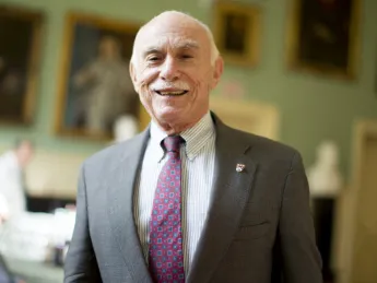 Michael Shinagel, with an Extension School shield on his lapel