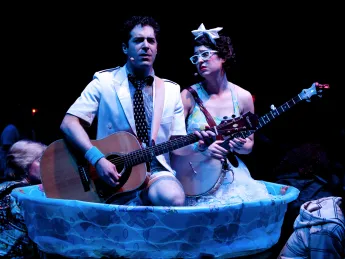 Zeke Sulkes (Frederic) and Christine Stulik (Mabel) in the kiddie pool. 