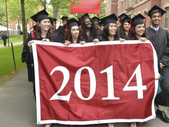 The Class of 2014 processed through the Old Yard to Memorial Church for the Baccalaureate service, which includes an address from President Drew Faust.