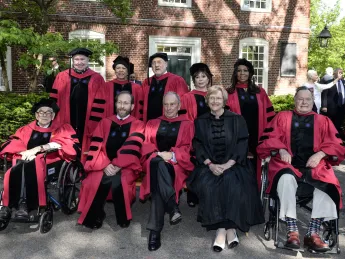 Front row from left: Seymour Slive, Provost Alan Garber, Michael R. Bloomberg, President Drew Faust, George H. W. Bush. Back row from left: Peter H. Raven, Patricia King, Joseph E. Stiglitz, Isabel Allende, Aretha Franklin